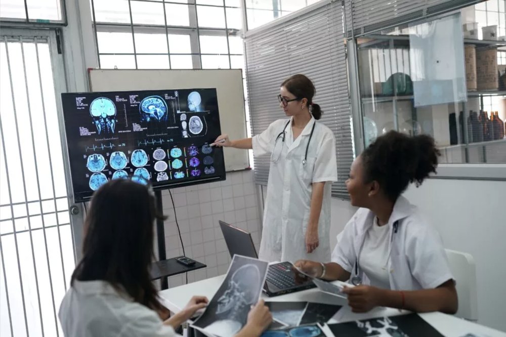 Clinical team reviewing diagnostic imaging